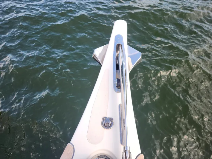 Pinnacle Yacht Photos Pics Bow of 2023 Hallberg-Rassy 57 yacht on water.