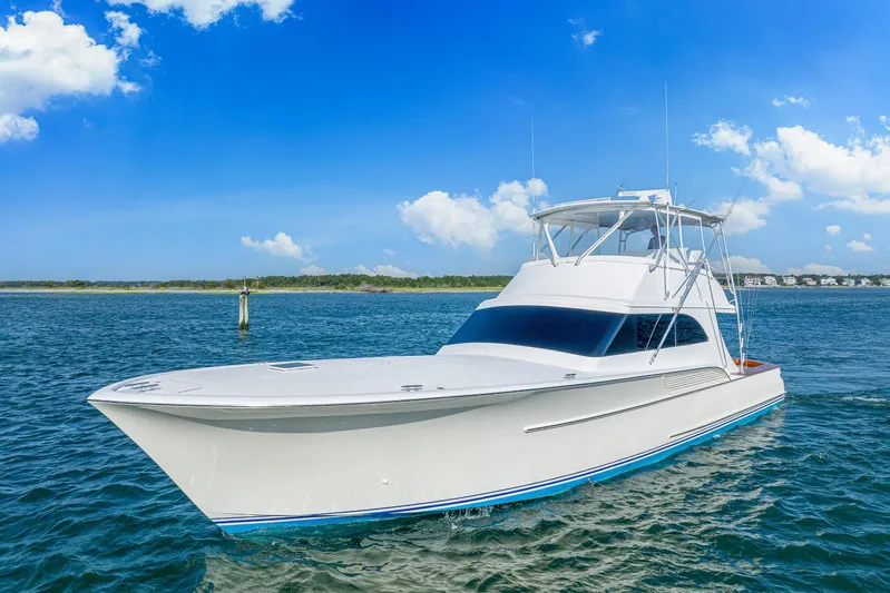 Let's Ride Yacht Photos Pics 2004 Sculley Custom Carolina 58' Sportfish yacht on open water under blue sky.