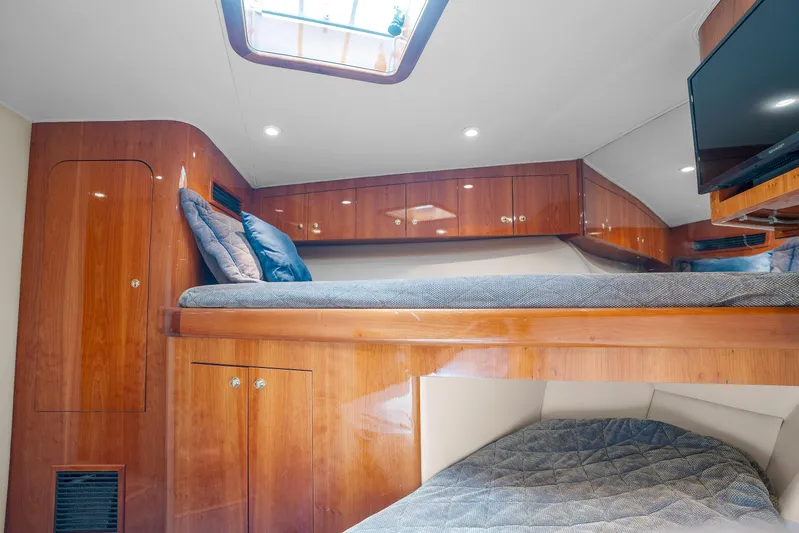 Let's Ride Yacht Photos Pics Luxurious cabin interior of 2004 Sculley Custom Carolina 58' Sportfish yacht.