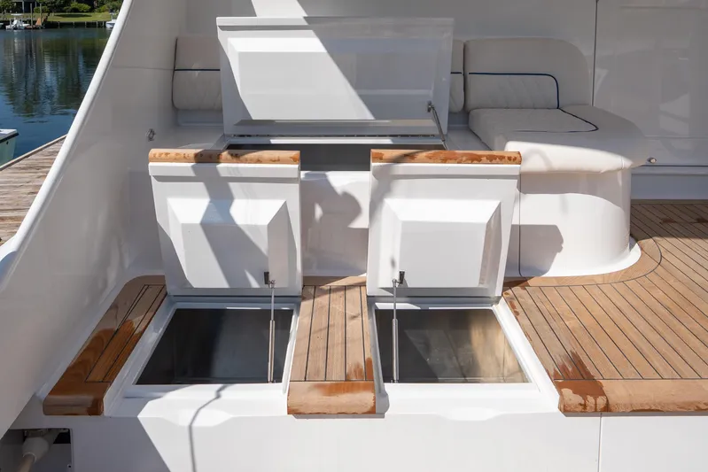 Let's Ride Yacht Photos Pics Luxury 2004 Sculley Custom Carolina 58' Sportfish yacht deck with open storage compartments.