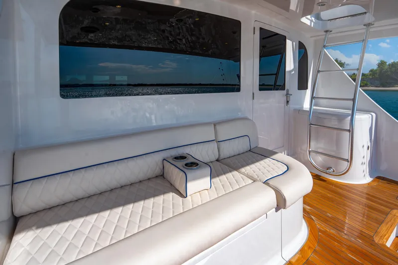 Let's Ride Yacht Photos Pics Luxurious seating area on a 2004 Sculley Custom Carolina 58' Sportfish yacht.