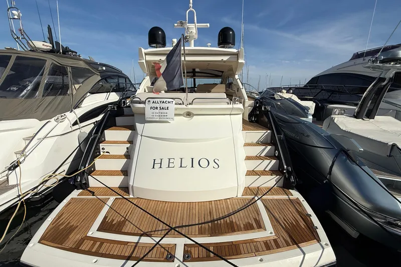 Helios Yacht Photos Pics Sunseeker Predator 60 yacht, 2010 model, docked and for sale, named "HELIOS".