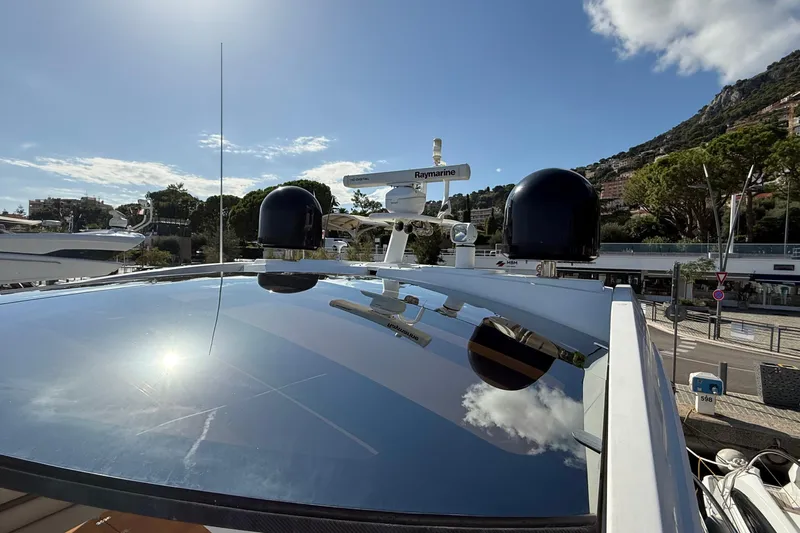 Helios Yacht Photos Pics Sunseeker Predator 60 yacht, 2010 model, with sleek design and advanced navigation equipment.