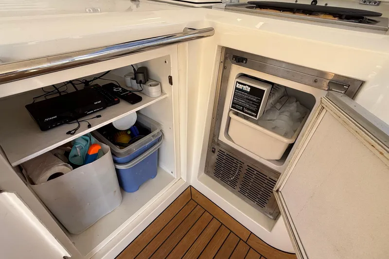 Helios Yacht Photos Pics Storage area and ice maker on 2010 Sunseeker Predator 60 yacht.