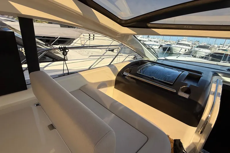 Helios Yacht Photos Pics Interior view of 2010 Sunseeker Predator 60 yacht at marina.