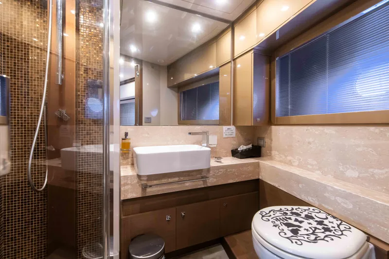  Yacht Photos Pics Luxurious bathroom in 2016 Ferretti Yachts 870, featuring elegant fixtures and modern design.