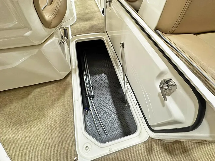  Yacht Photos Pics 2017 Sea Ray SLX 310 boat storage compartment with open hatch and visible equipment.