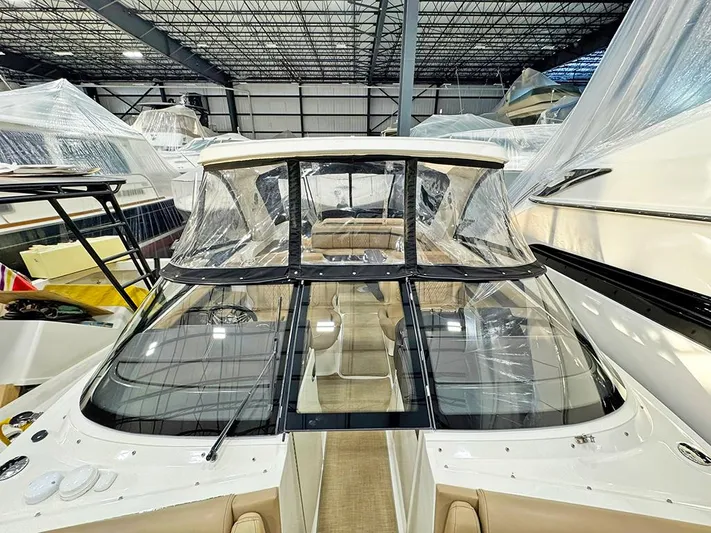  Yacht Photos Pics 2017 Sea Ray SLX 310 boat in storage, covered and protected indoors.