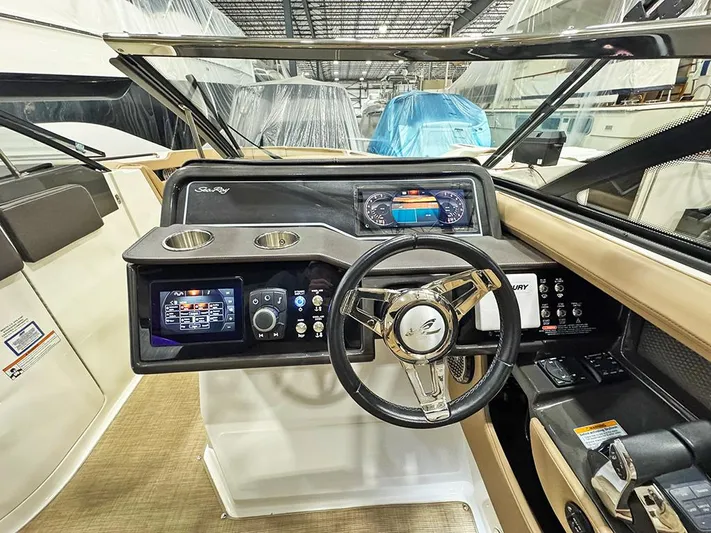  Yacht Photos Pics 2017 Sea Ray SLX 310 boat dashboard with steering wheel and digital displays.