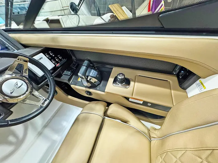  Yacht Photos Pics 2017 Sea Ray SLX 310 boat interior with tan leather seating and modern controls.