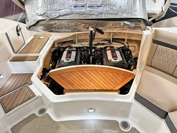  Yacht Photos Pics 2017 Sea Ray SLX 310 boat engine compartment with twin engines and teak accents.