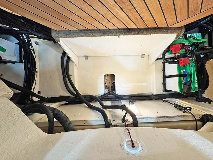  Yacht Photos Pics Engine compartment of 2017 Sea Ray SLX 310 boat, showcasing wiring and components.