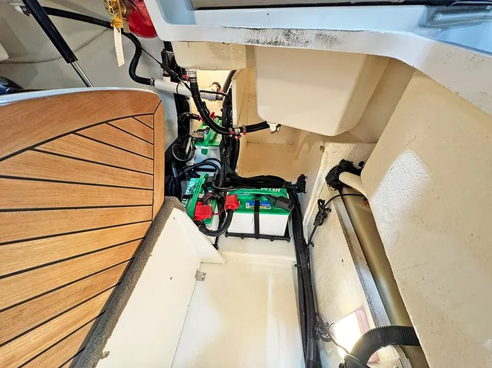  Yacht Photos Pics 2017 Sea Ray SLX 310 boat interior showing battery compartment and wiring.