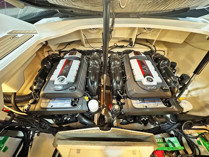  Yacht Photos Pics Twin engines in a 2017 Sea Ray SLX 310 boat, showcasing powerful performance.