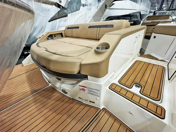  Yacht Photos Pics 2017 Sea Ray SLX 310 boat with tan seating and teak flooring.