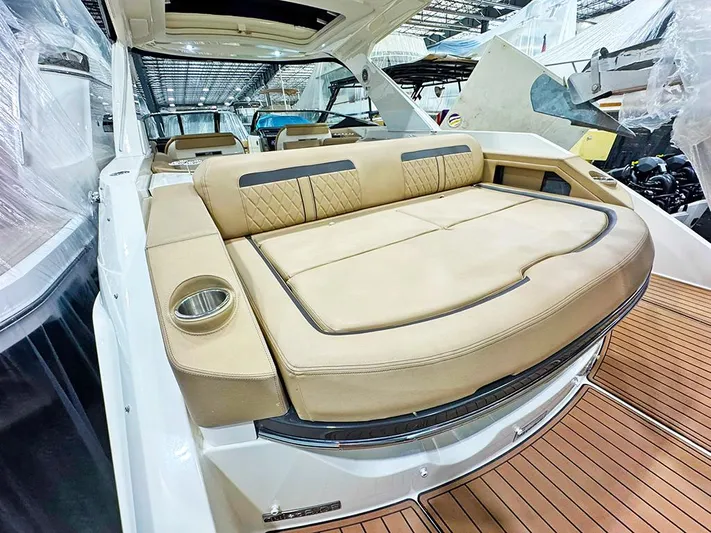  Yacht Photos Pics 2017 Sea Ray SLX 310 boat with luxurious tan seating and sleek design.