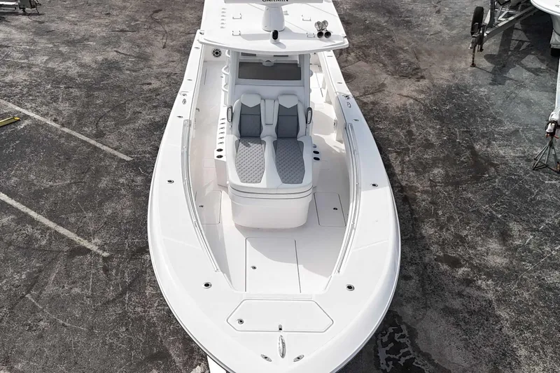  Yacht Photos Pics 2025 Invincible 36 Open Fisherman boat, aerial view, sleek design, spacious deck.