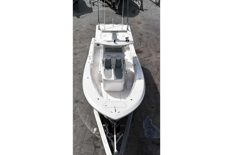  Yacht Photos Pics 2025 Invincible 36 Open Fisherman boat, aerial view, sleek design, white exterior.