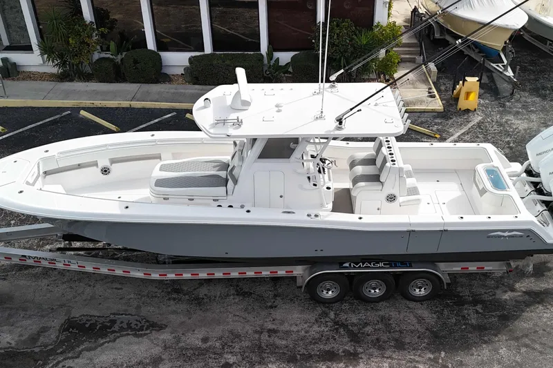  Yacht Photos Pics 2025 Invincible 36 Open Fisherman boat on trailer, aerial view.