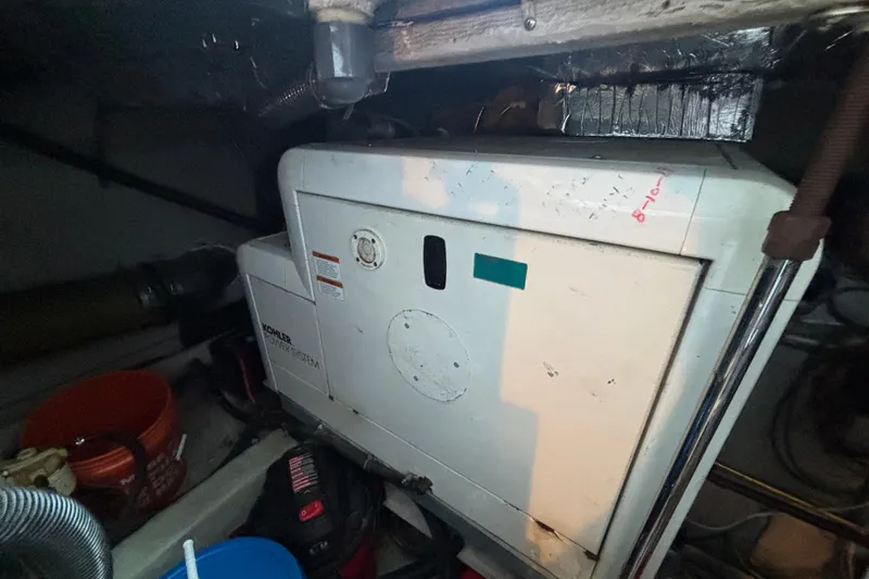 Moonstruck Yacht Photos Pics Engine room of 1998 Carver 530 Voyager Pilothouse with Kohler power system.