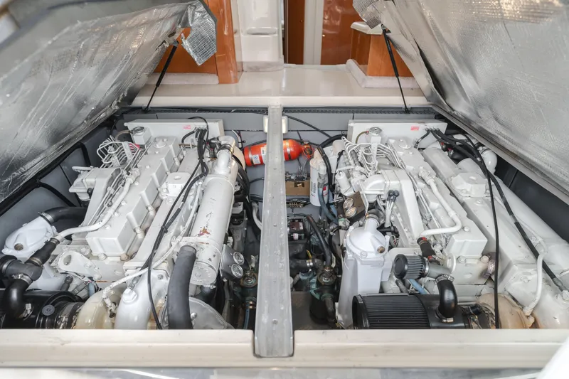 Waterfront Property Yacht Photos Pics Engine room of a 2000 Sea Ray 400 Sedan Bridge yacht with twin engines.
