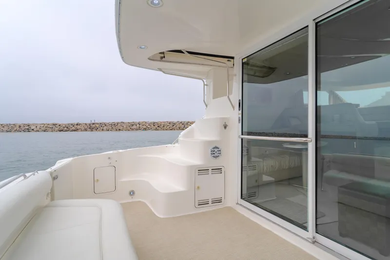 Waterfront Property Yacht Photos Pics 2000 Sea Ray 400 Sedan Bridge yacht deck with sliding glass door.