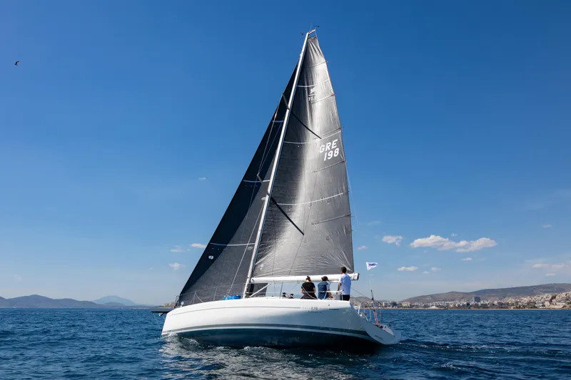  Yacht Photos Pics Italia Yachts IY11.98 Bellissima 2023 sailing on open sea under clear blue sky.