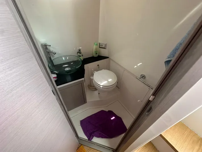  Yacht Photos Pics Compact bathroom in 2023 3B Craft 330 CC boat with modern fixtures.