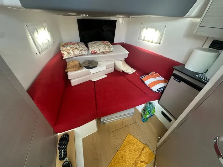  Yacht Photos Pics Interior of 2023 3B Craft 330 CC boat with red seating and modern amenities.