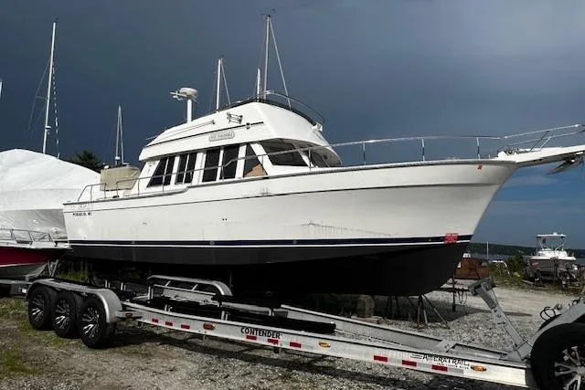Talisman Yacht Photos Pics 2003 Mainship 430 Aft Cabin Trawler on trailer, ready for transport.