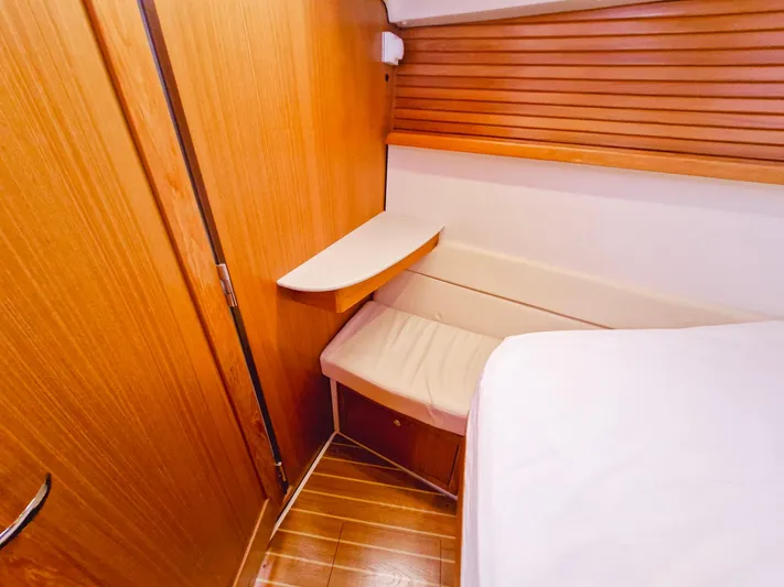  Yacht Photos Pics 2011 Catalina 445 yacht interior with wooden paneling and cozy seating area.