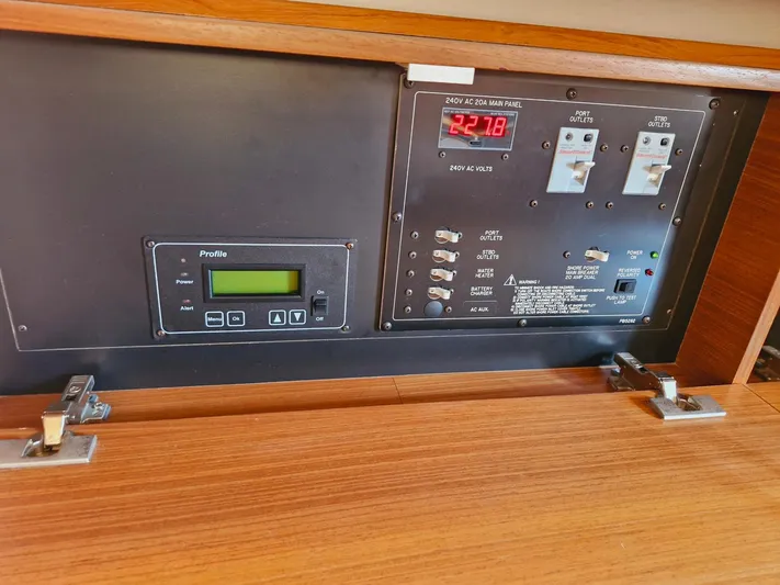  Yacht Photos Pics Control panel of a 2011 Catalina 445 sailboat with digital display and switches.