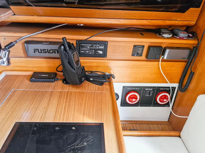  Yacht Photos Pics Interior of a 2011 Catalina 445 yacht with communication equipment and control panel.