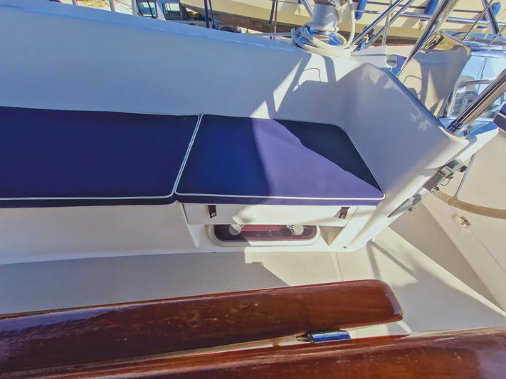 Yacht Photos Pics 2011 Catalina 445 sailboat cockpit with blue cushioned seating.