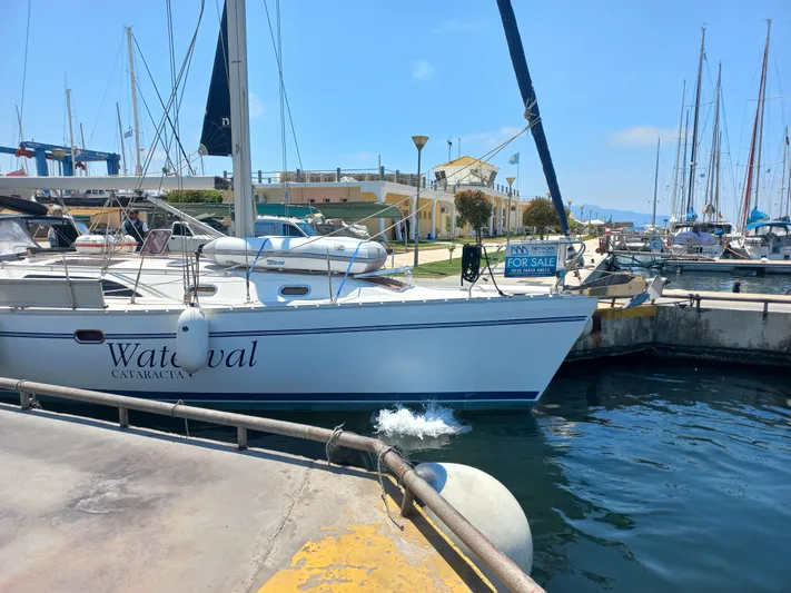  Yacht Photos Pics Catalina 445 sailboat from 2011 docked, with "For Sale" sign visible.