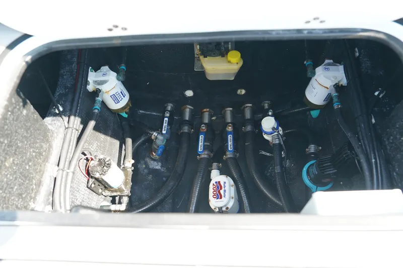 Yacht Photos Pics Bilge area of 2020 Yellowfin 26 Hybrid boat showing pumps and hoses.