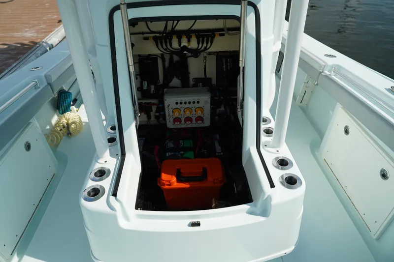  Yacht Photos Pics 2020 Yellowfin 26 Hybrid boat console with open access to electrical components.