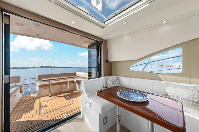 Nauti-lin Yacht Photos Pics Interior of 2016 Carver C37 Coupe yacht with open deck view.