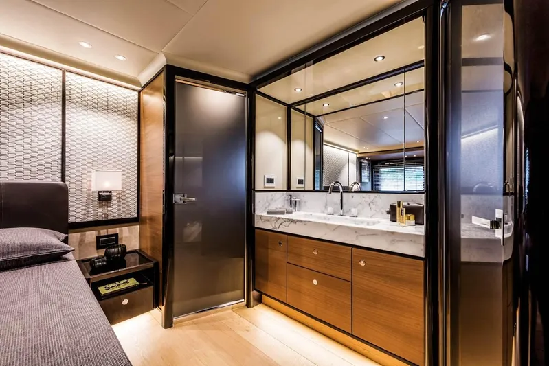  Yacht Photos Pics Luxurious bathroom interior on 2019 Absolute Navetta 73 yacht, featuring modern design and elegant finishes.