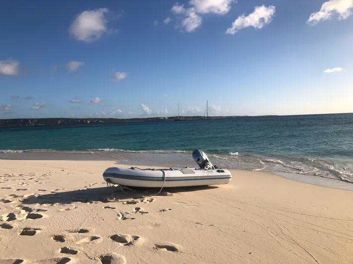 Juul Yacht Photos Pics Inflatable boat on sandy beach with ocean view, CNB 66, 2019.