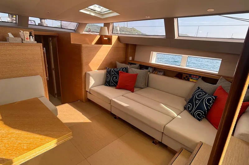 Juul Yacht Photos Pics Luxurious interior of 2019 CNB 66 yacht with modern seating and natural light.