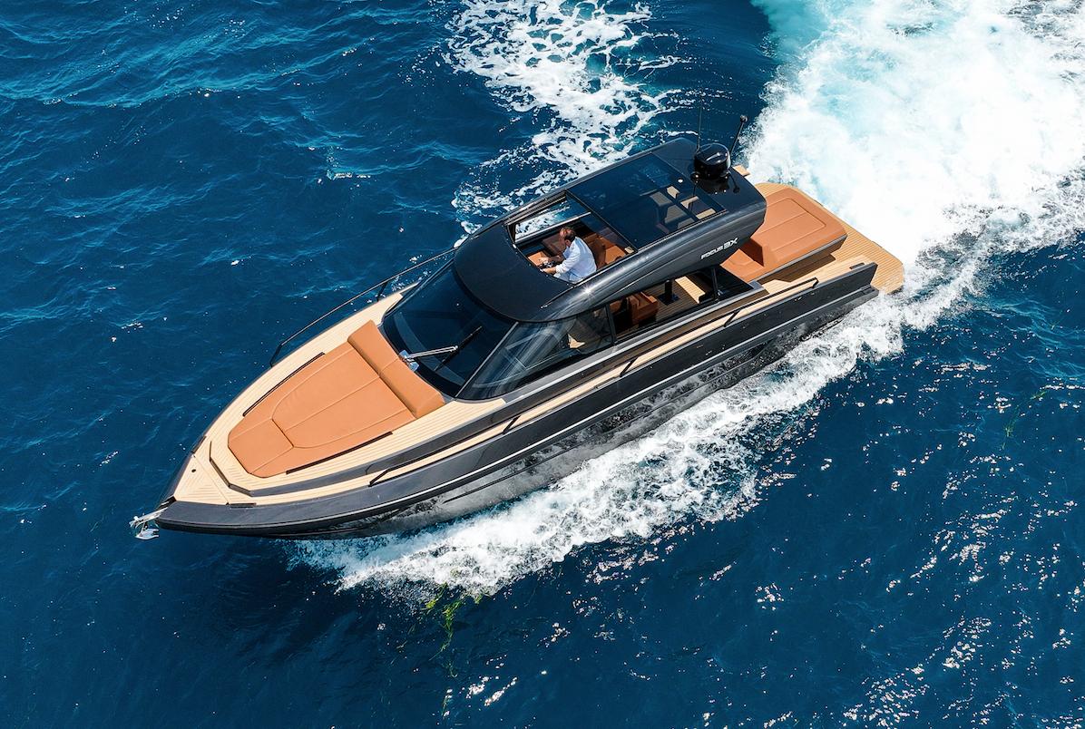Luxurious Focus 3X yacht cruising on vibrant blue ocean waters, 2026 model.