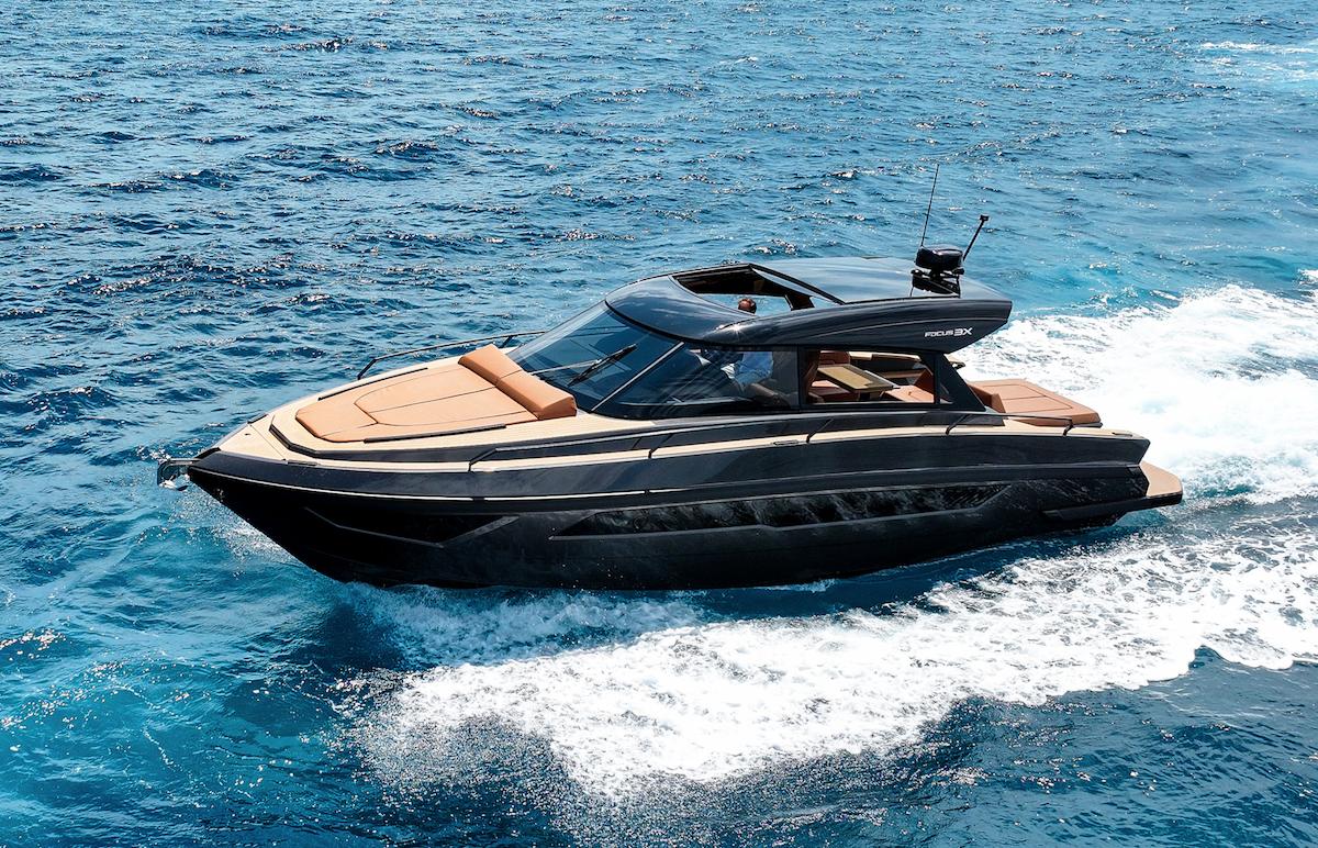 Luxury Focus 3X yacht cruising on blue ocean waters, 2026 model.