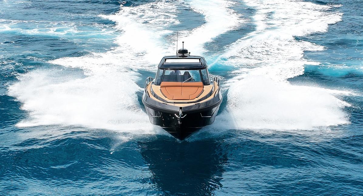 Luxury Focus 3X yacht cruising through vibrant blue ocean waves, 2026 model.