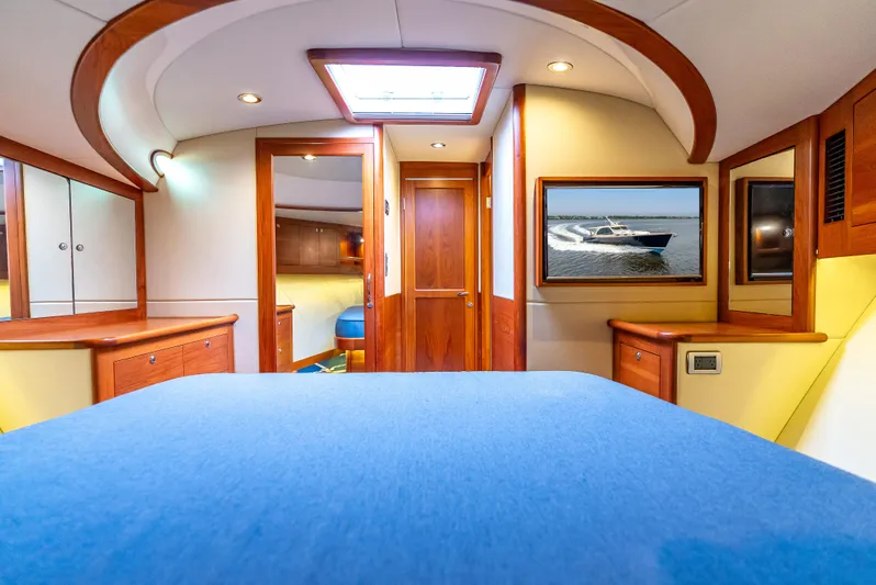 Zephyr Yacht Photos Pics Luxurious interior of 2018 Palm Beach Motor Yachts PB55, featuring elegant wood finishes and modern design.