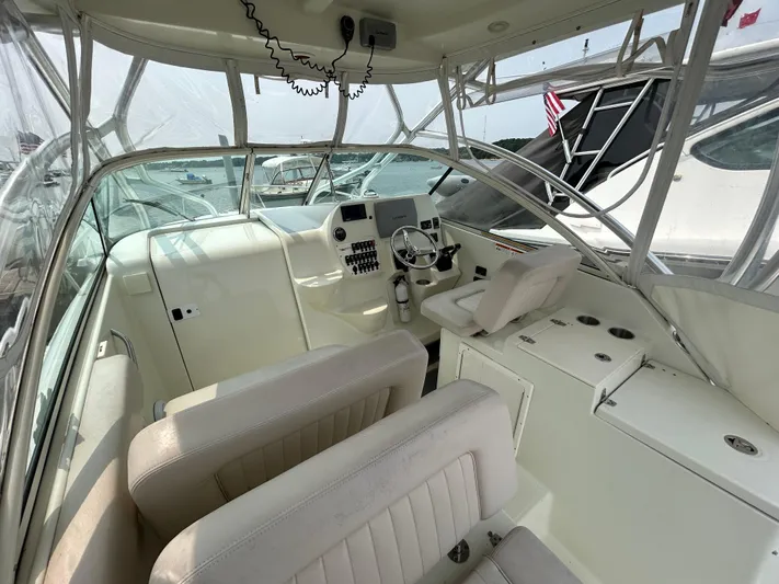 Good Sport Yacht Photos Pics 2011 Hydra-Sports 3000 VX boat interior with steering wheel and seating.