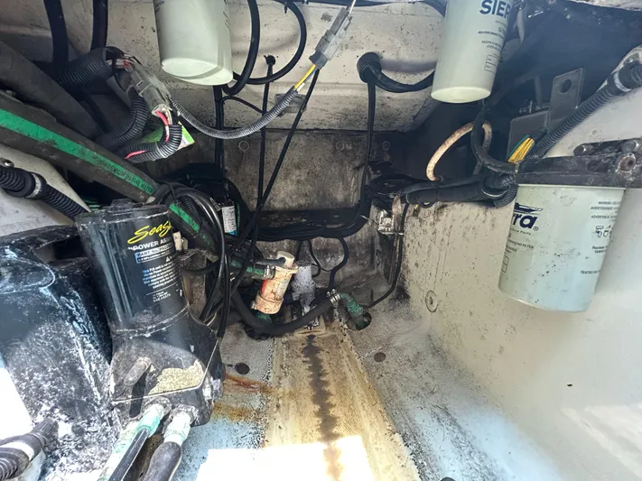 Good Sport Yacht Photos Pics Engine compartment of a 2011 Hydra-Sports 3000 VX boat, showing various components and wiring.