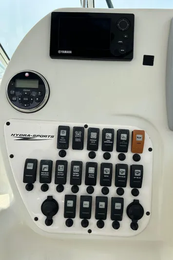 Good Sport Yacht Photos Pics Control panel of a 2011 Hydra-Sports 3000 VX boat with Yamaha display and switches.