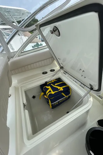 Good Sport Yacht Photos Pics 2011 Hydra-Sports 3000 VX boat storage compartment with life jackets inside.