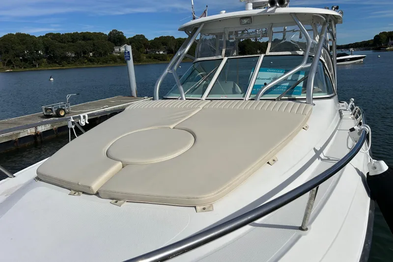 Good Sport Yacht Photos Pics 2011 Hydra-Sports 3000 VX boat docked by a serene lake.